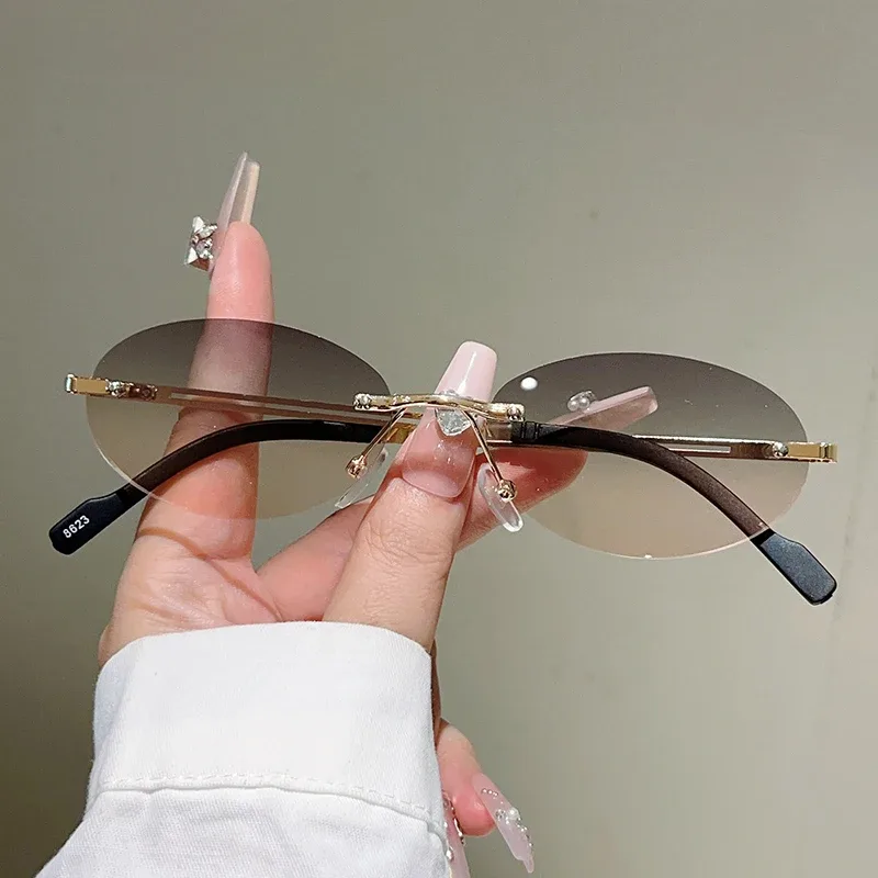 Lunettes de soleil ovales sans monture