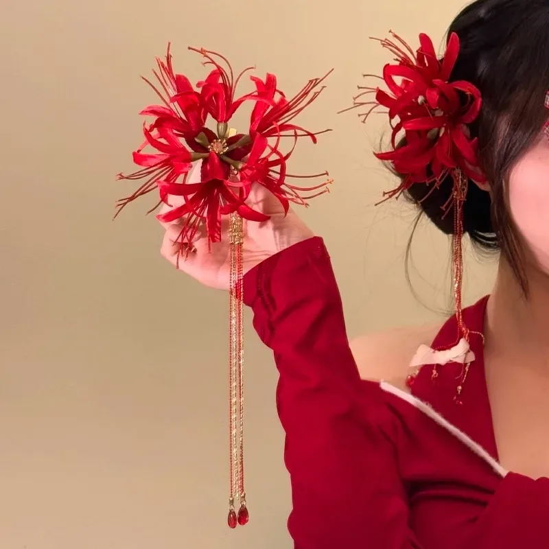 Pince à cheveux fleur rouge à pompon